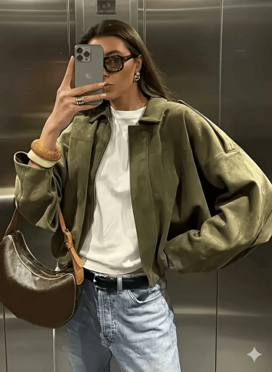 Ethereal Edge Jacket Series model showcasing timeless suede perfection in a chic urban setting.